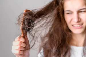 woman struggling brush hair 23 2148547377