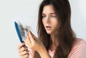 What is the main reason for hair loss in females